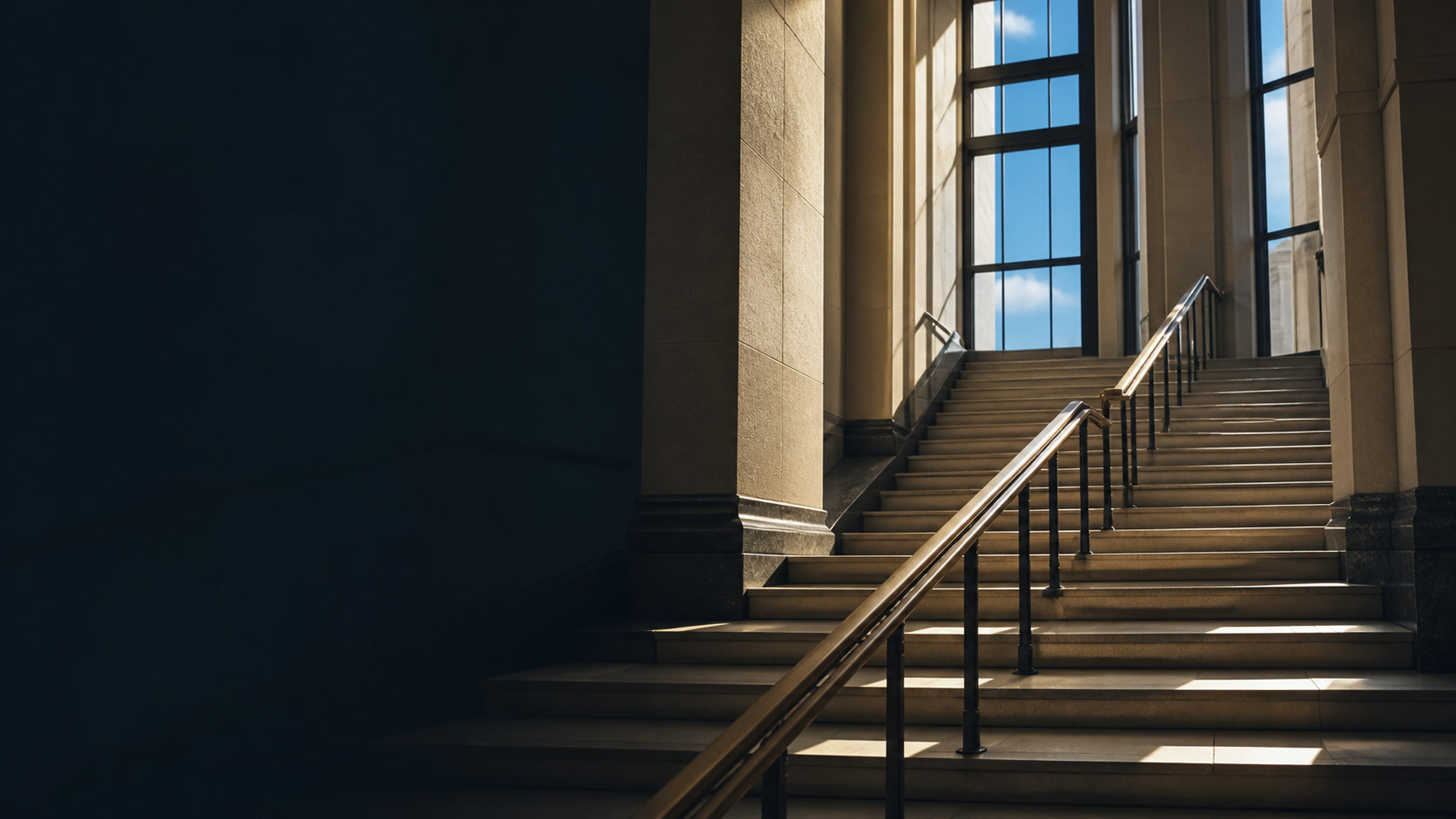 Sunlit stone stairs inside an American courthouse