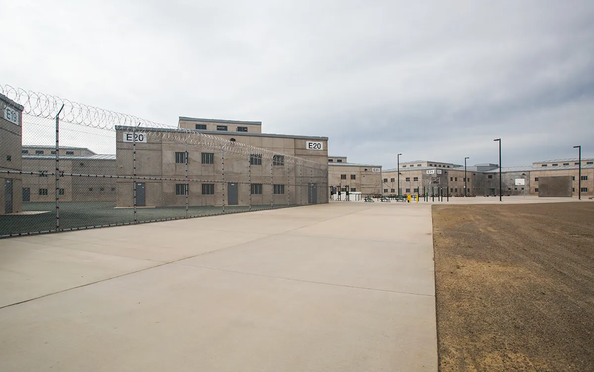 Building E20 and secure yard at Mule Creek State Prison